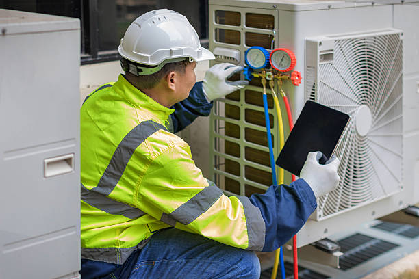 Professional Hvac technician working in Morganville, NJ